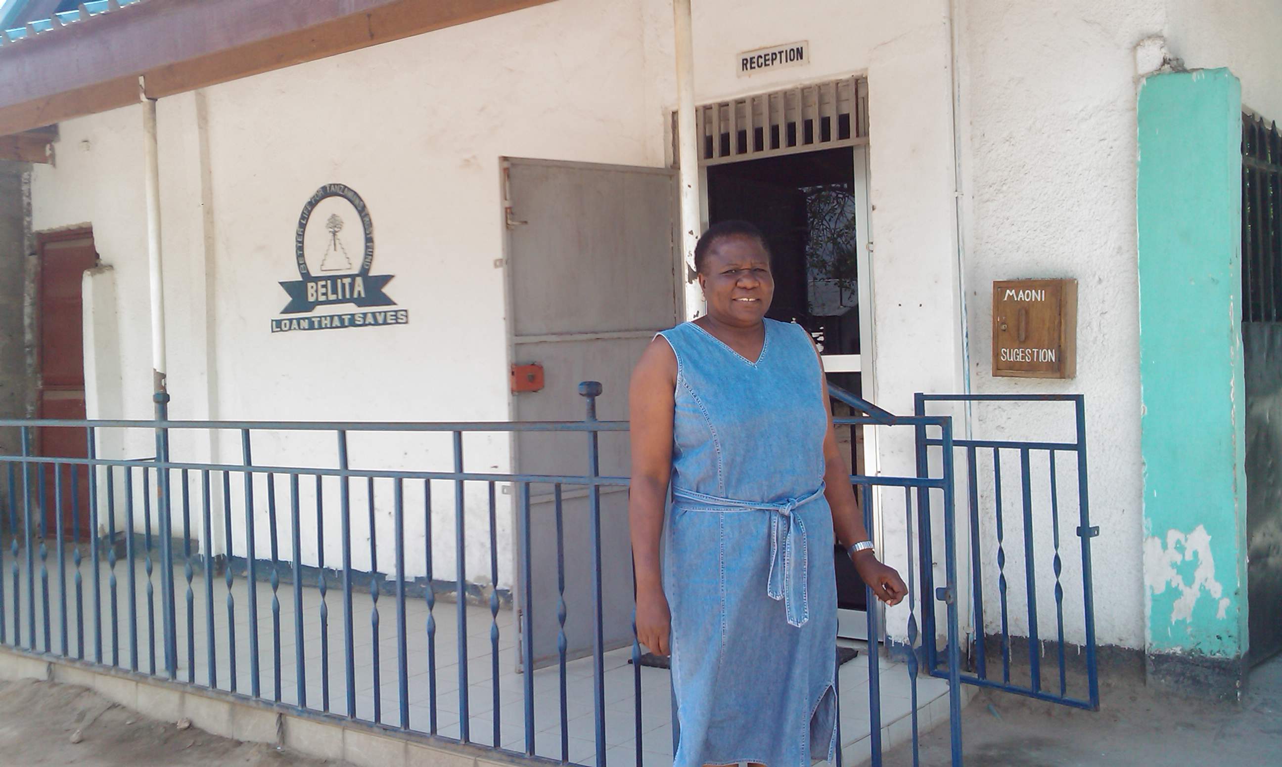 Helena, the BELITA founder, standing in front of the servant's quarter's old BELITA office. 