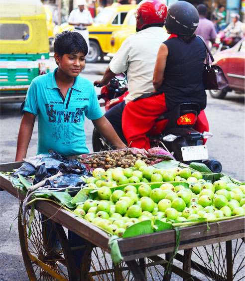 A young fruit seller in the streets of Kolkata. Photo: Sayamindu Dasgupta